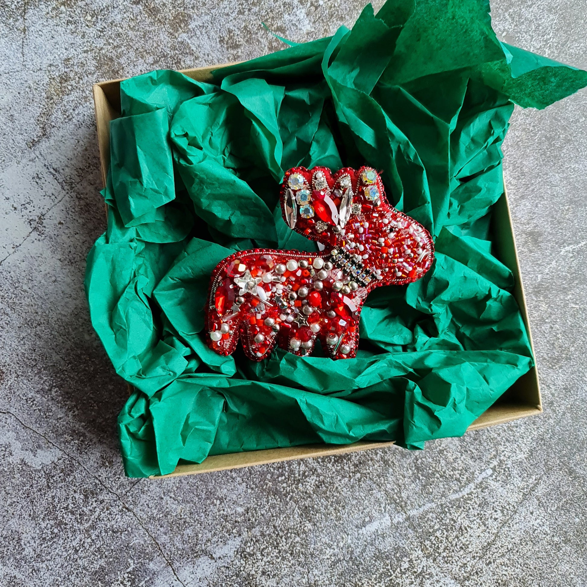 Handmade red Christmas reindeer brooch embroidered with beads, pearls and crystals, festive holiday pin, 6.5 x 9 cm.