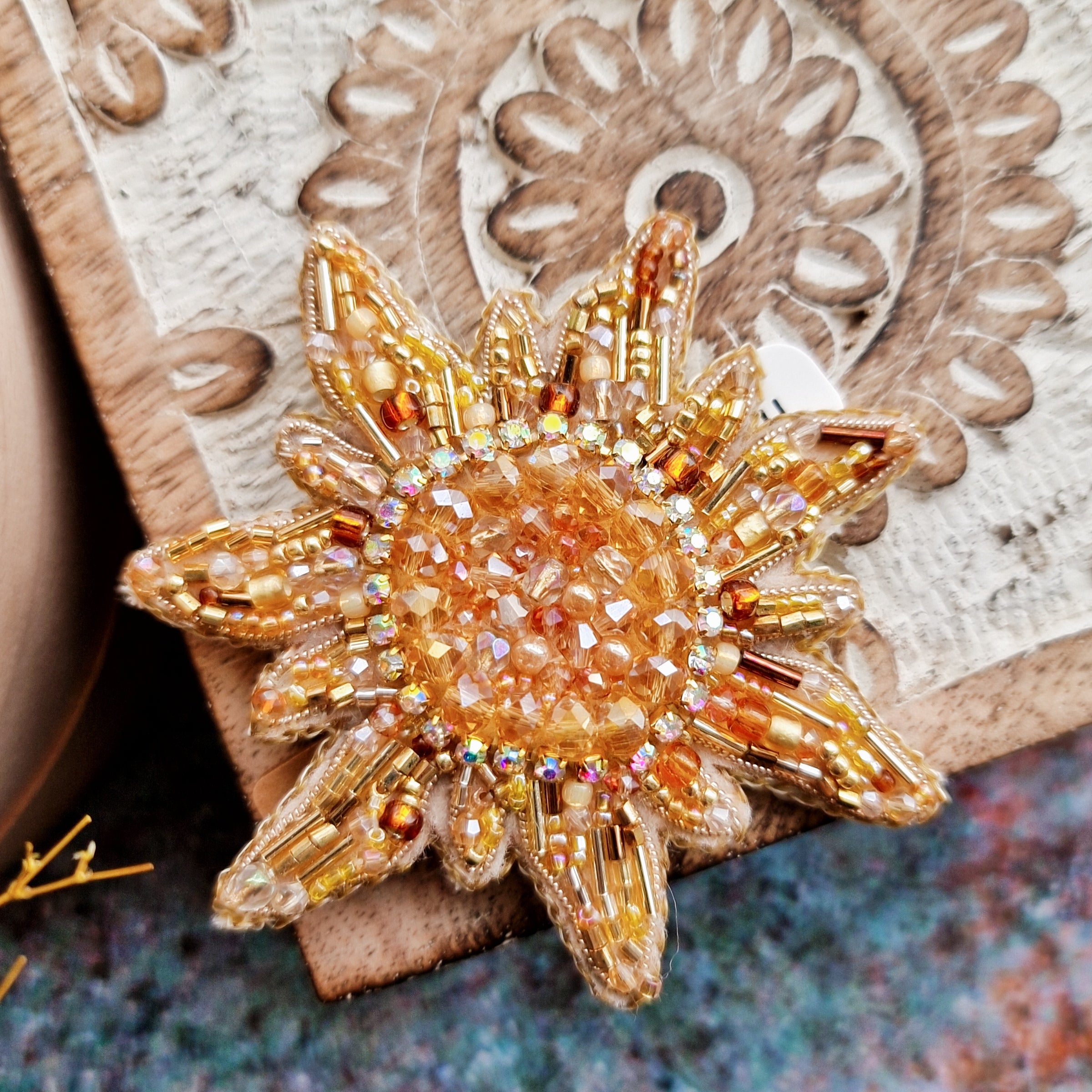 Sun and moon beaded brooches hand embroidered with crystals pearls and celestial details