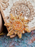Sun and moon beaded brooches hand embroidered with crystals pearls and celestial details