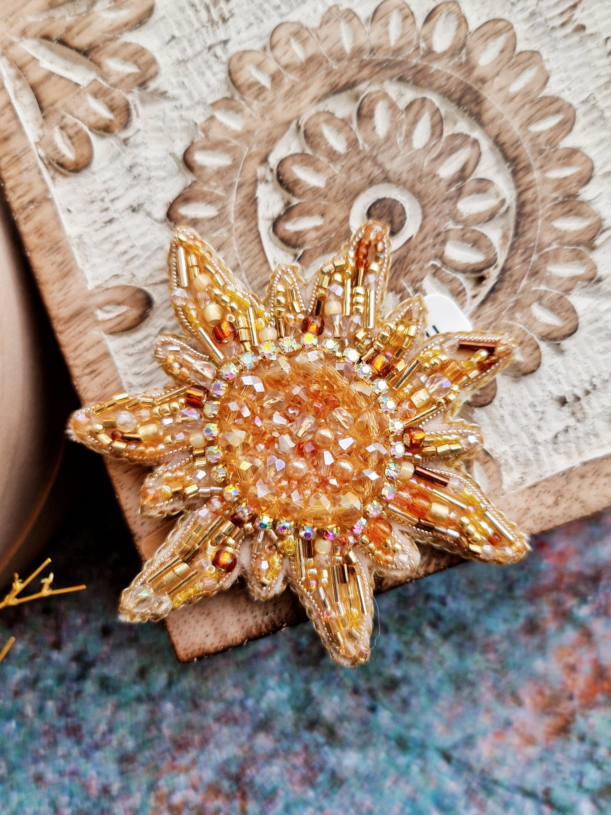 Sun and moon beaded brooches hand embroidered with crystals pearls and celestial details