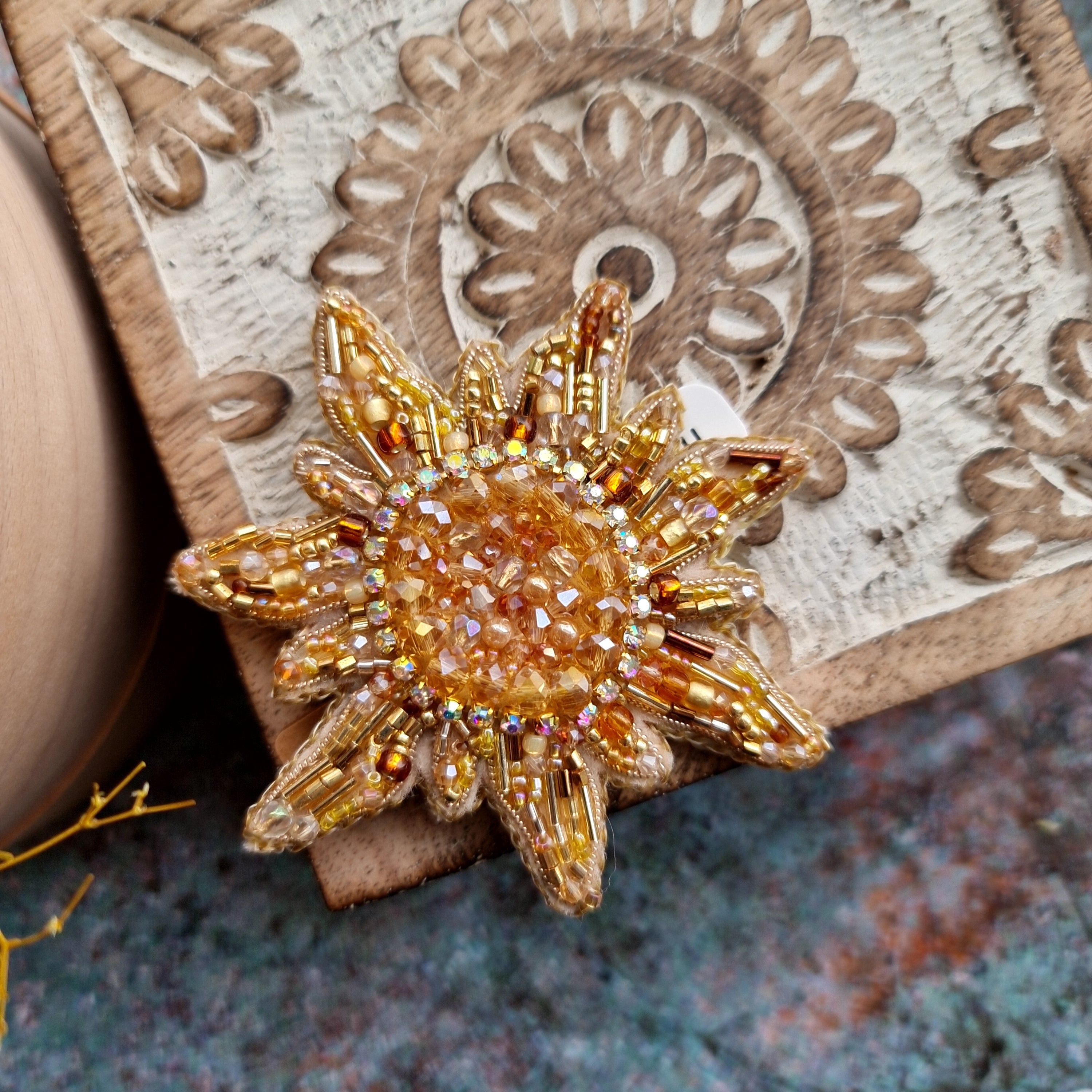 Sun and moon beaded brooches hand embroidered with crystals pearls and celestial details