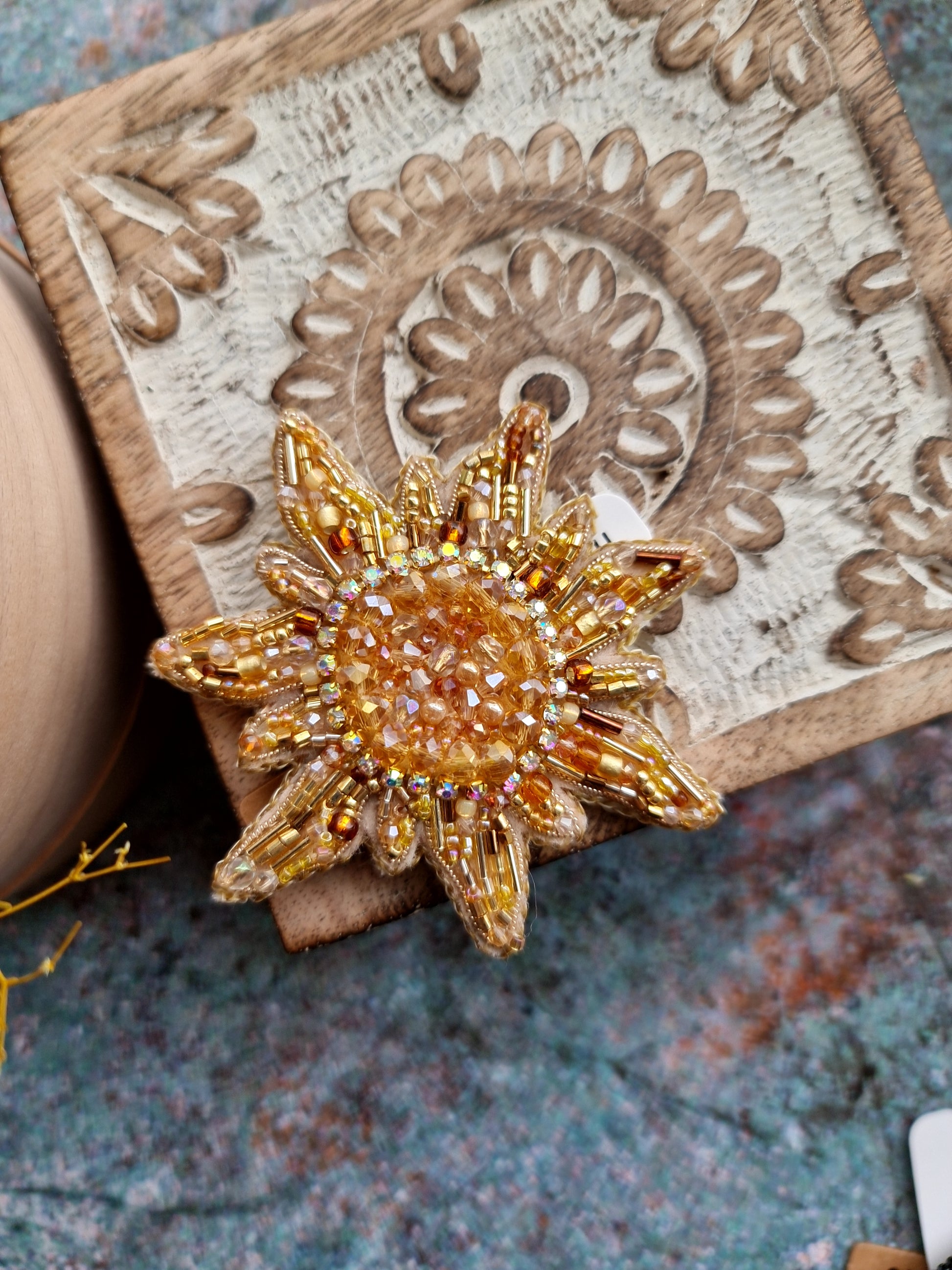 Sun and moon beaded brooches hand embroidered with crystals pearls and celestial details