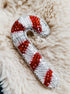 Handmade Christmas candy cane brooch embroidered with red and white beads, festive holiday pin, 8 x 4.5 cm.
