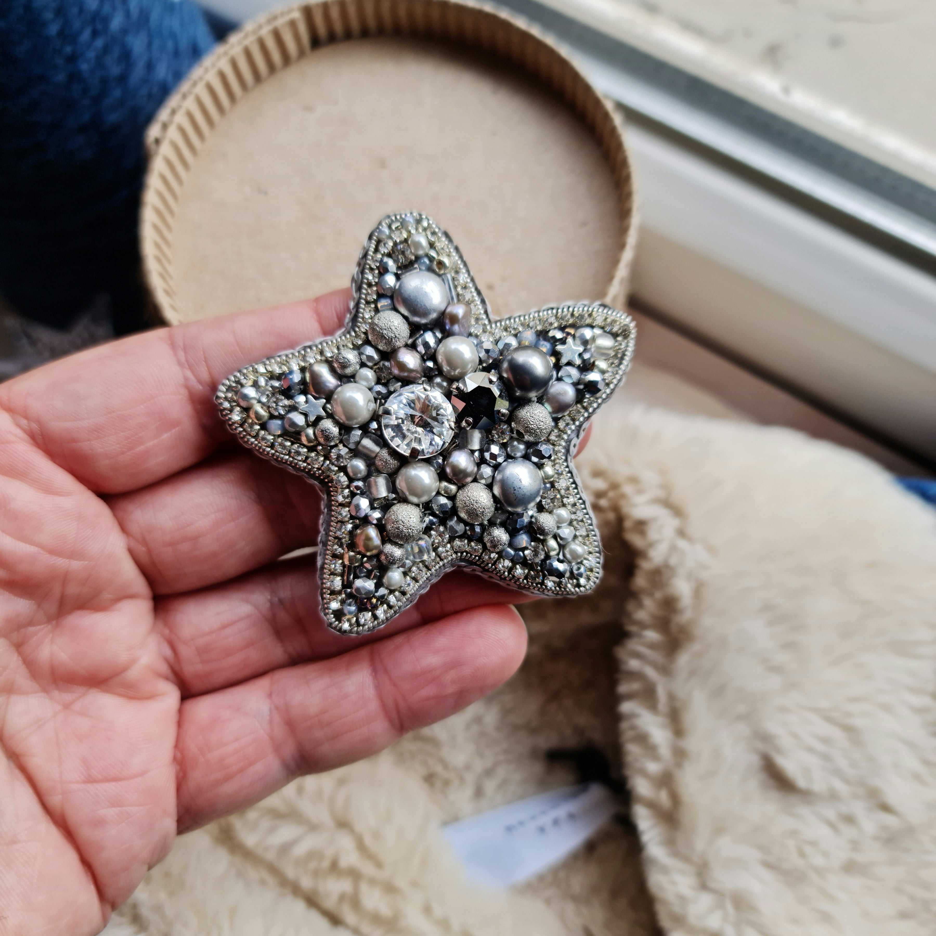 Silver star beaded brooch hand embroidered with pearls crystals and metallic bead details