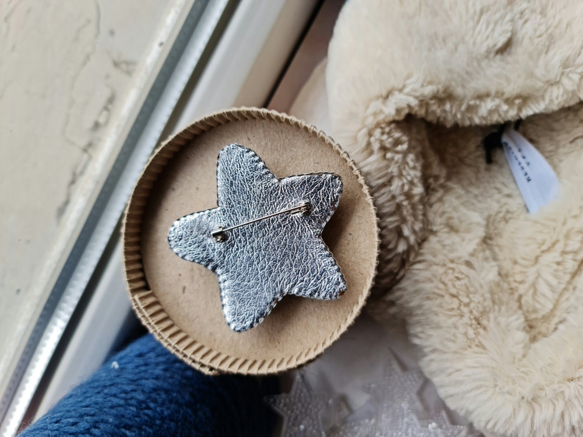 Silver star beaded brooch