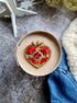 Handmade beaded brooch inspired by magical girl anime, featuring intricate embroidery and shimmering beads in a celestial moon design.
