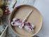 Purple and white dragonfly beaded brooch hand embroidered with crystals, pearls, glass beads, and delicate sparkling wing details