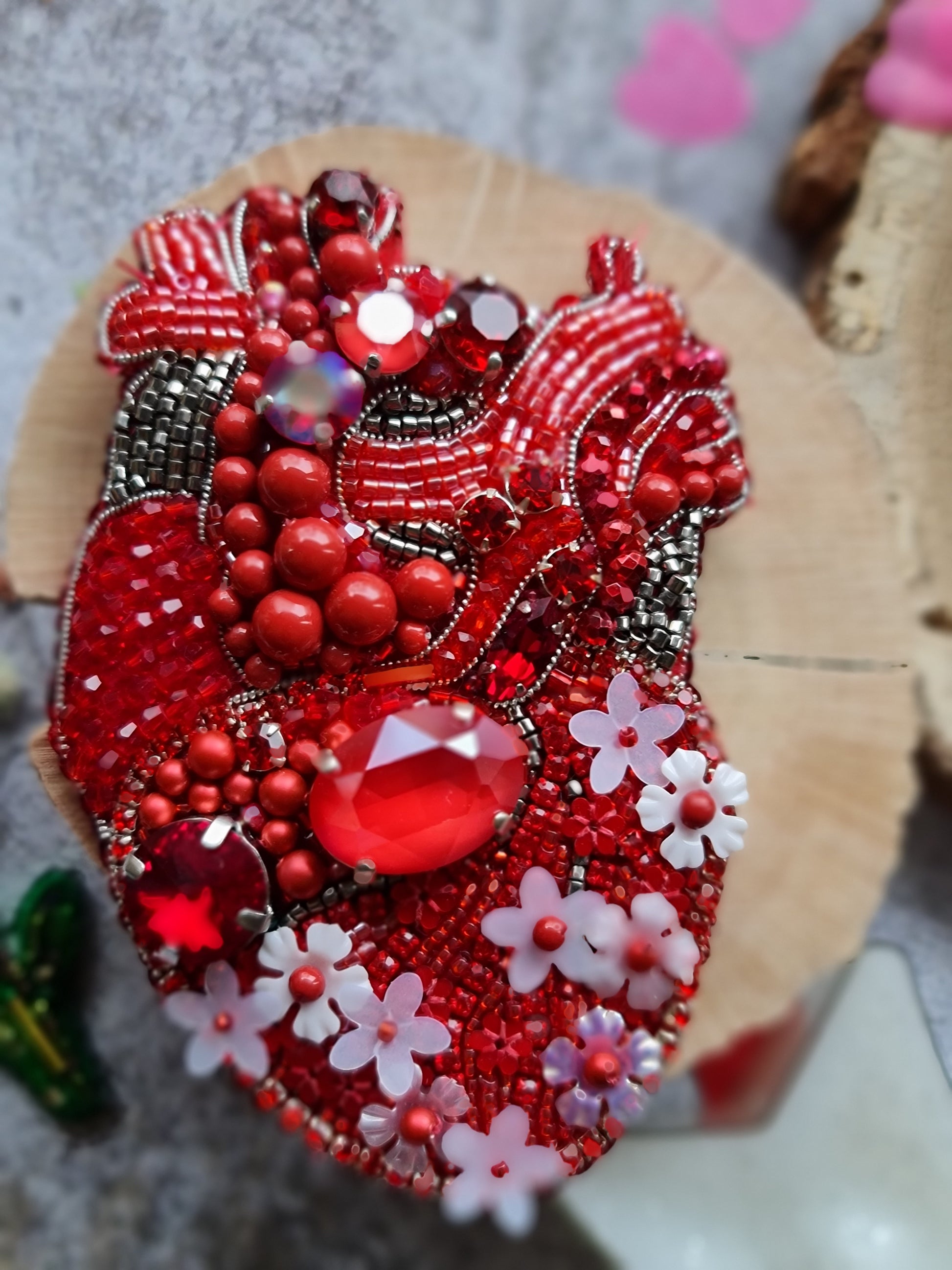 Red anatomical heart beaded brooch hand embroidered with crystals flowers and blue details