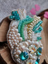 Pearl anatomical heart beaded brooch hand embroidered with turquoise crystals and pearl details