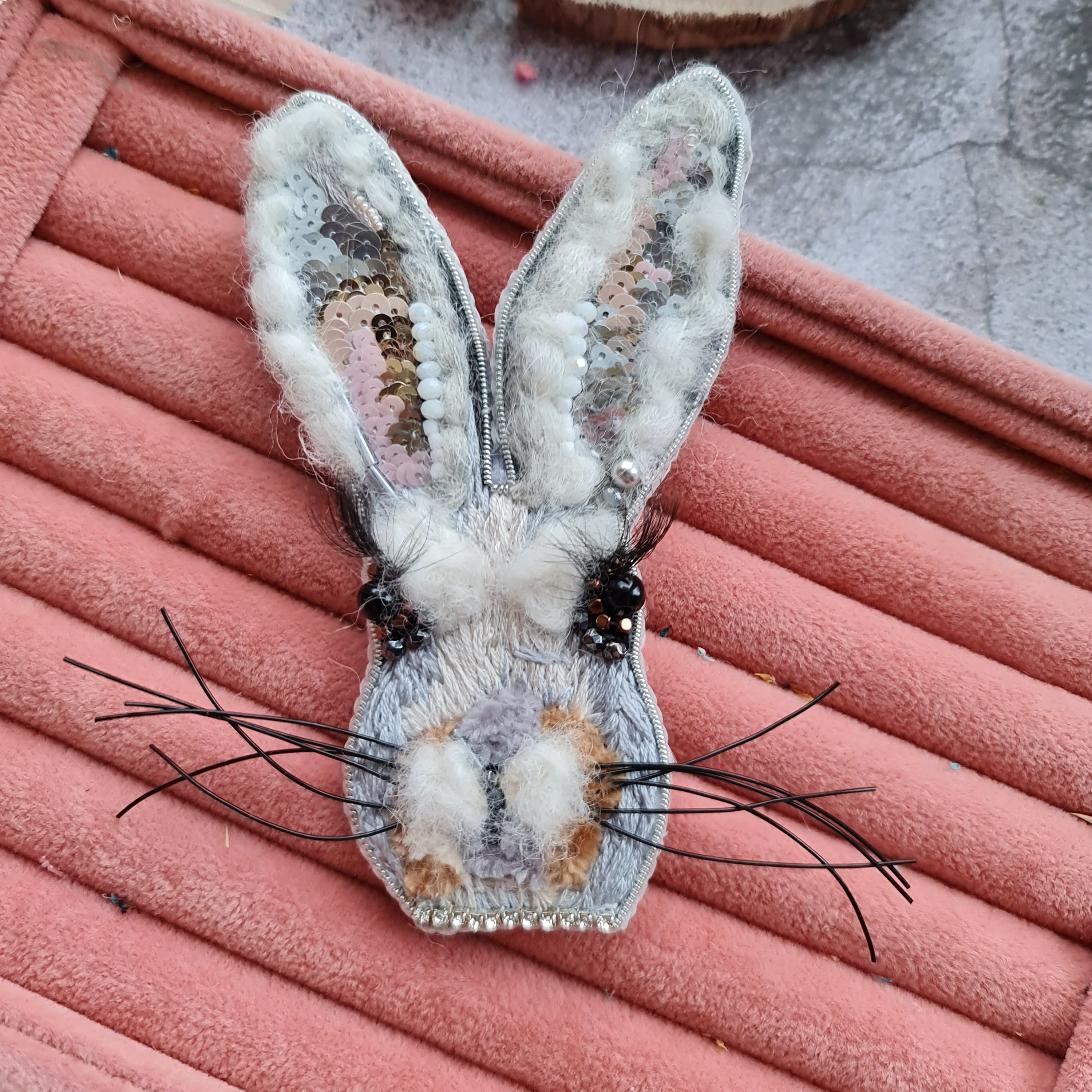 Gray bunny face beaded brooch hand embroidered with long ears whiskers and fluffy details