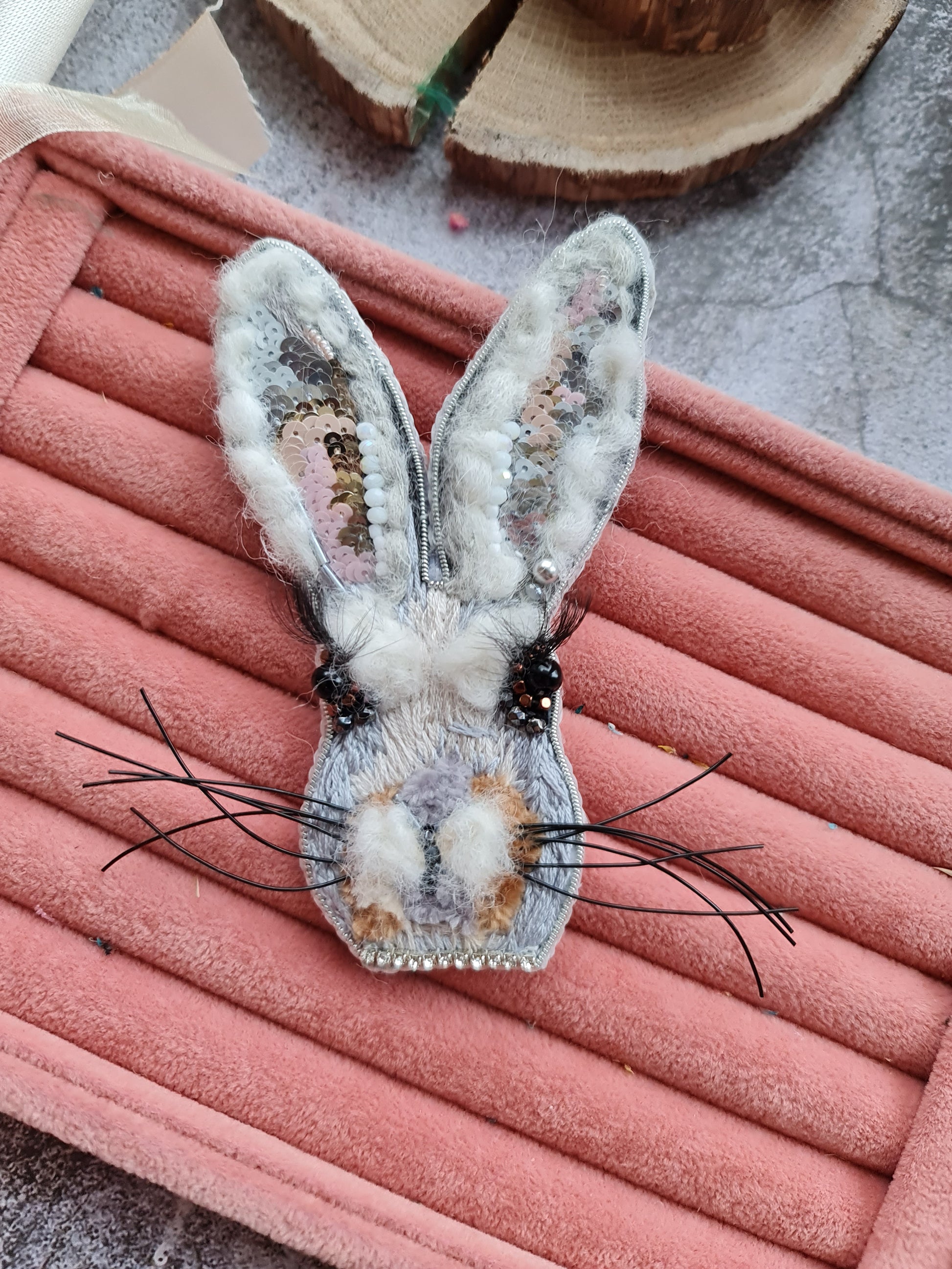 Gray bunny face beaded brooch hand embroidered with long ears whiskers and fluffy details