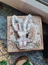 Gray bunny face beaded brooch hand embroidered with long ears whiskers and fluffy details