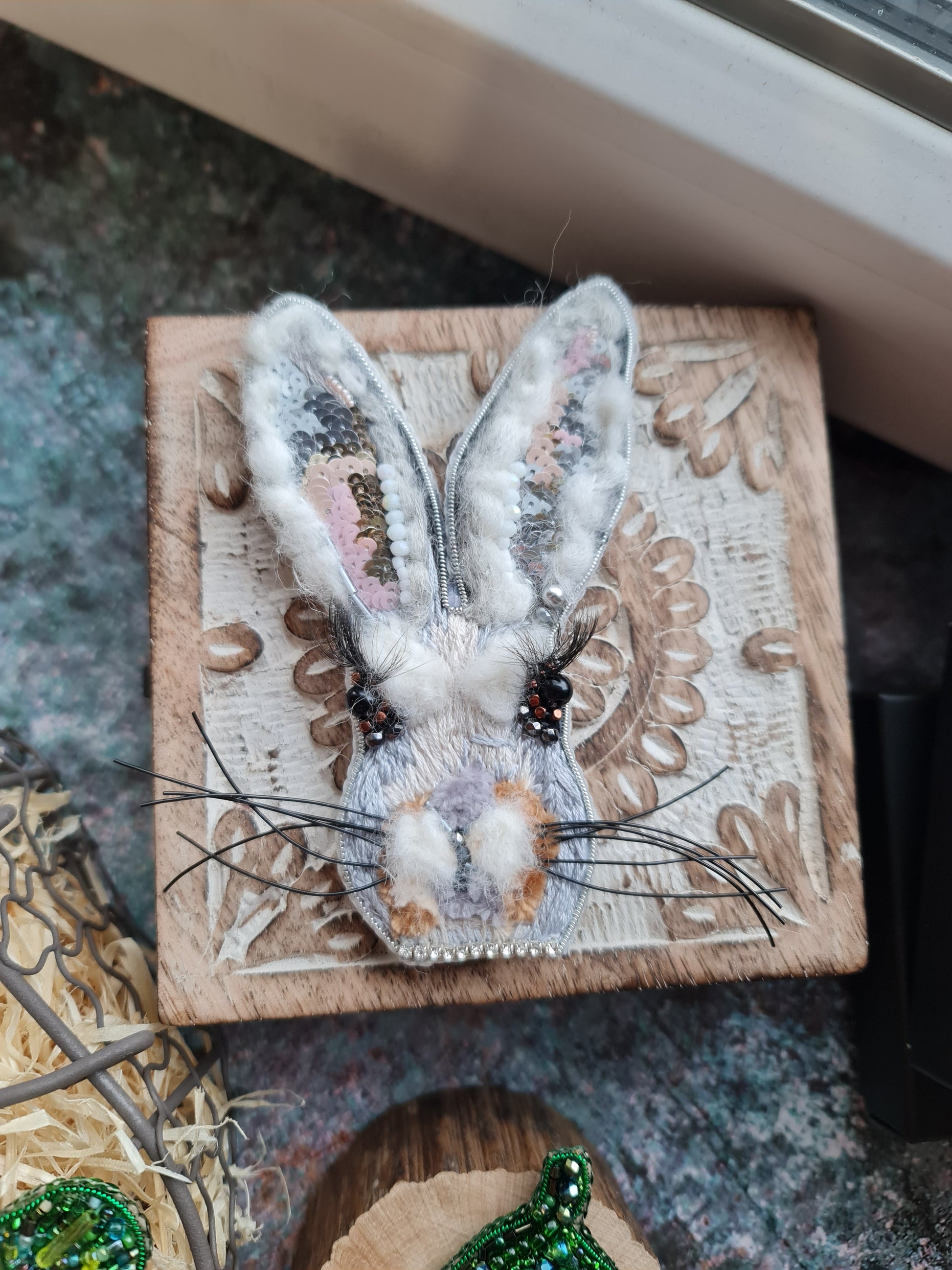 Gray bunny face beaded brooch hand embroidered with long ears whiskers and fluffy details