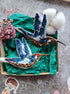 Blue hummingbird beaded brooch hand embroidered with blue white and brown thread, crystals, beads, and sparkling bird details