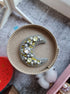 Sun and moon beaded brooches hand embroidered with crystals pearls and celestial details