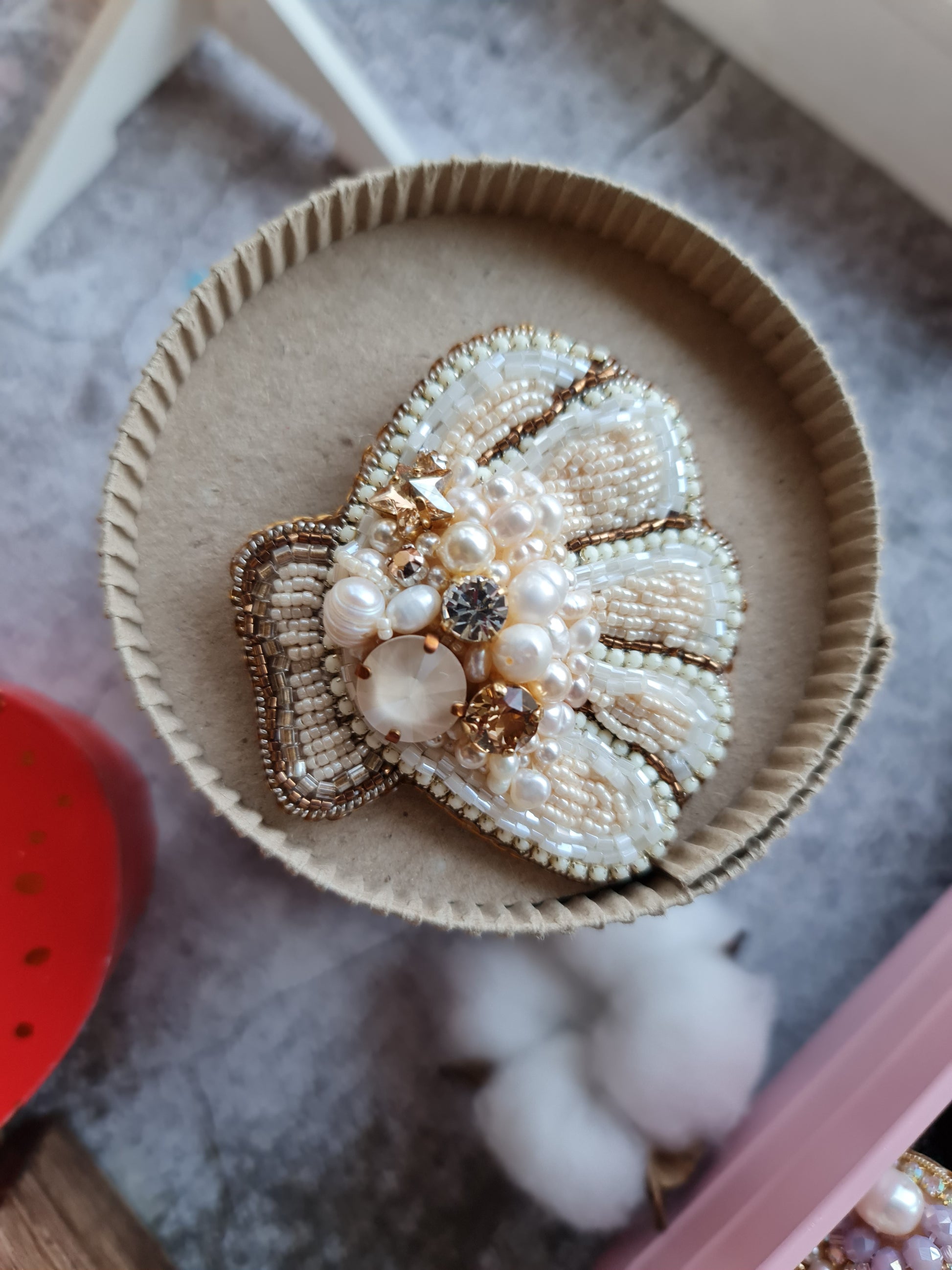 Round pearl shell beaded brooch hand embroidered with pearls crystals and beads in soft ivory and champagne tones