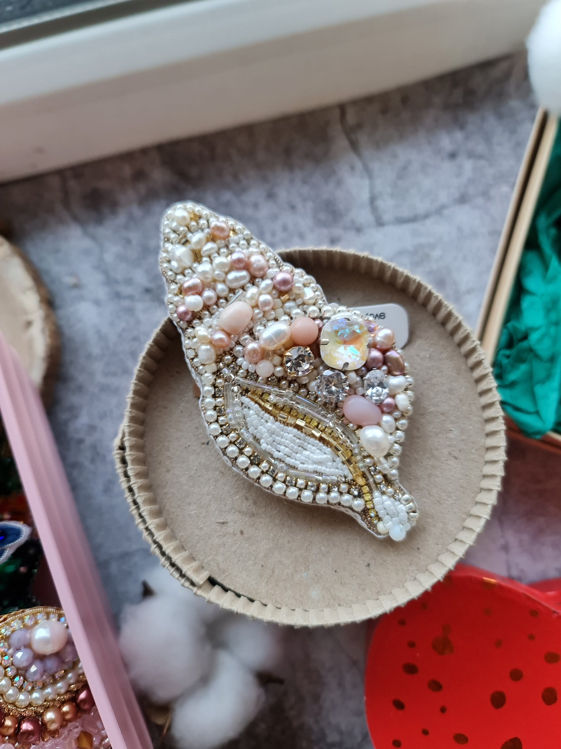 Spiral pearl shell beaded brooch hand embroidered with pearls crystals and beads in ivory blush and gold tones