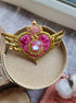 Handmade Cosmic Heart Compact Brooch featuring intricate beading and embroidery, measuring 2.36 inches x 3.74 inches (6 cm x 9.5 cm), with a celestial heart design