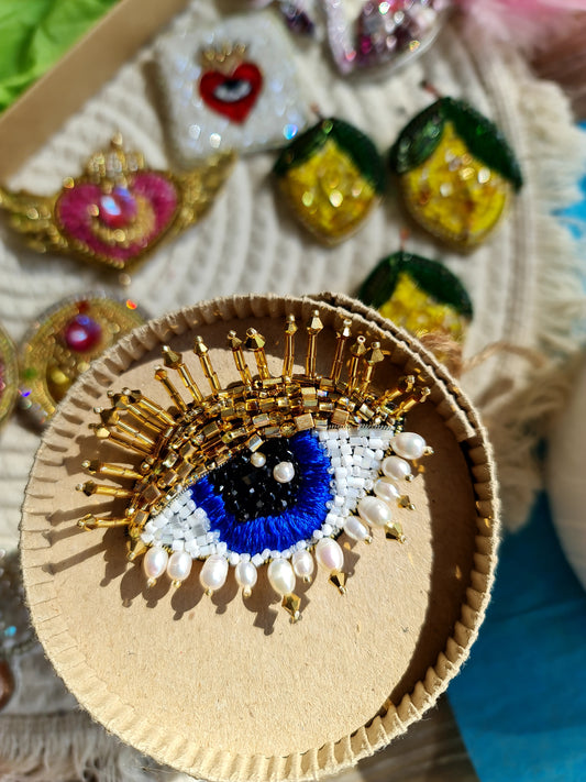 Handcrafted Enchanting Gaze Eye Brooch featuring a captivating eye design, measuring 2.34 inches by 2.14 inches (6 cm by 5.5 cm), perfect as an elegant jewelry gift for her.