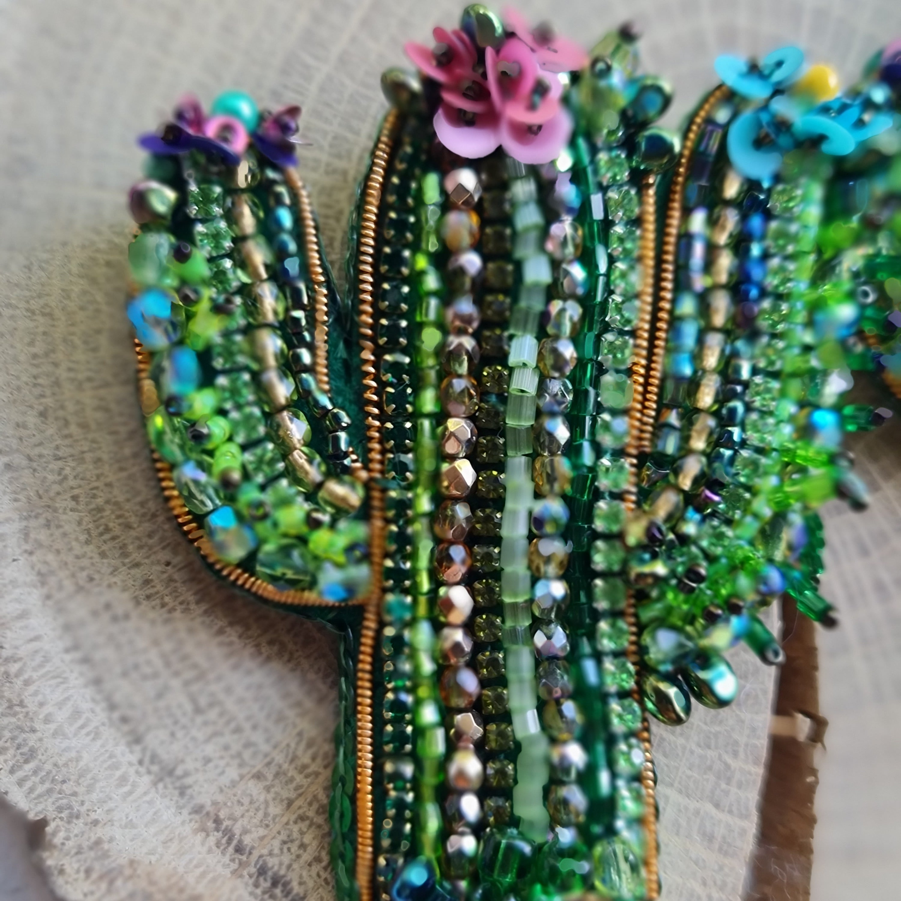 Green cactus beaded brooch hand embroidered with colorful flowers crystals and gold details