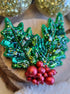 Handmade Christmas holly berry brooch with green beaded leaves and red berries, festive holiday pin, 7.5 x 8 cm.
