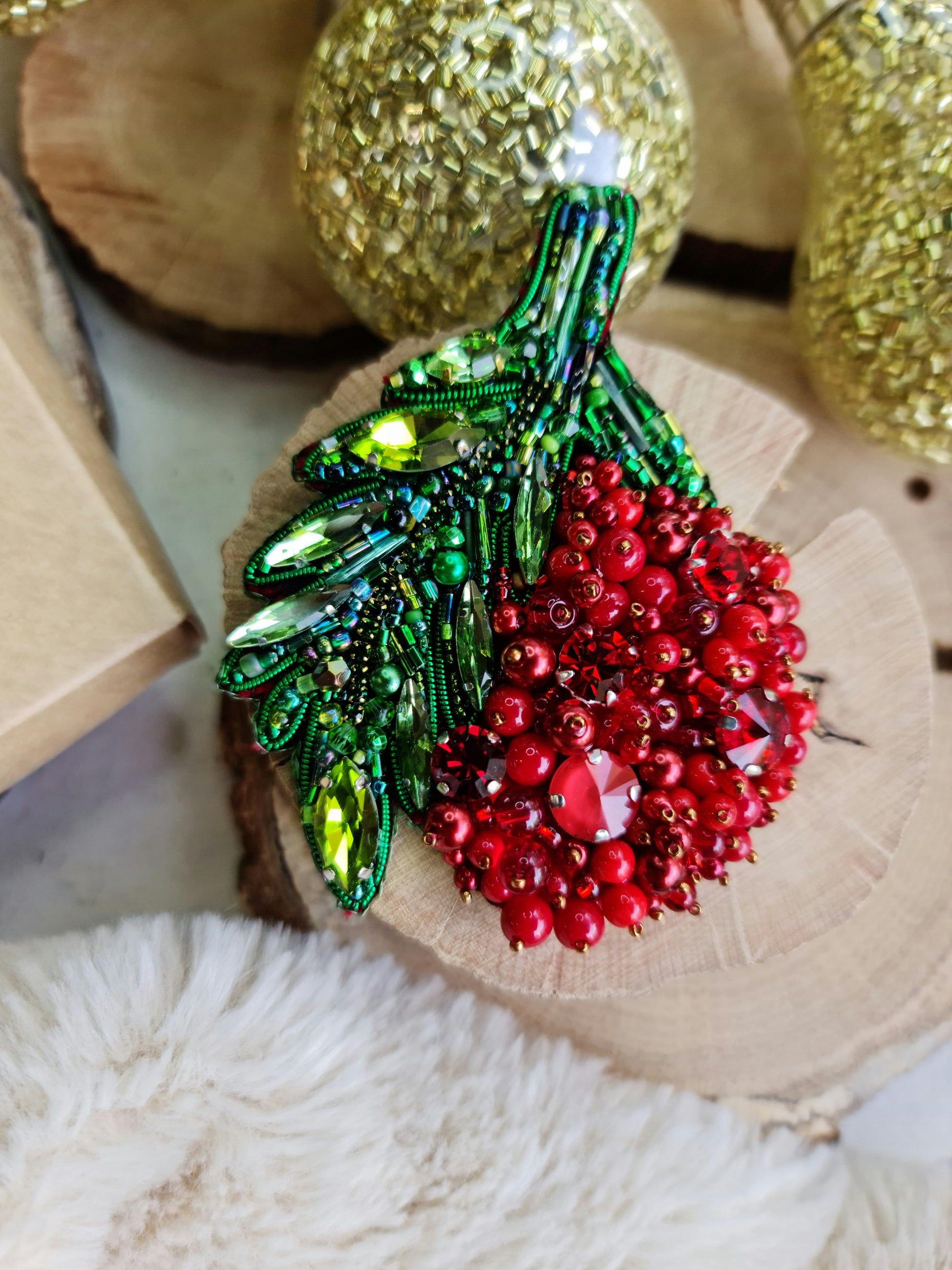 Red berry beaded brooch hand embroidered with green leaves crystals and bead details