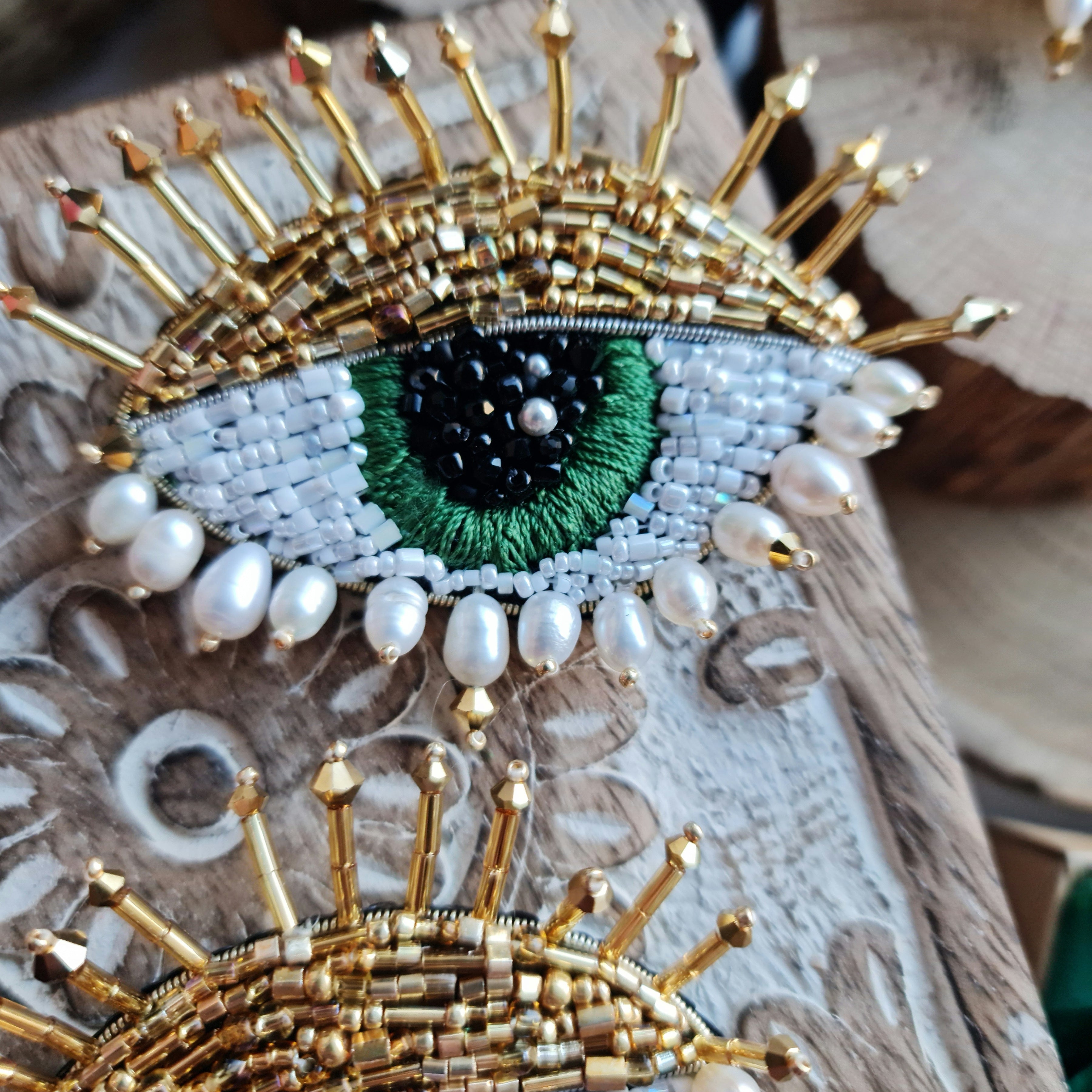 Green eye beaded brooch hand embroidered with glass beads and crystals