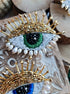Close-up view of the intricate eye motif on the Enchanting Gaze Eye Brooch, showcasing detailed craftsmanship and unique design elements