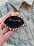 Close-up view of the intricate eye motif on the Enchanting Gaze Eye Brooch, showcasing detailed craftsmanship and unique design elements