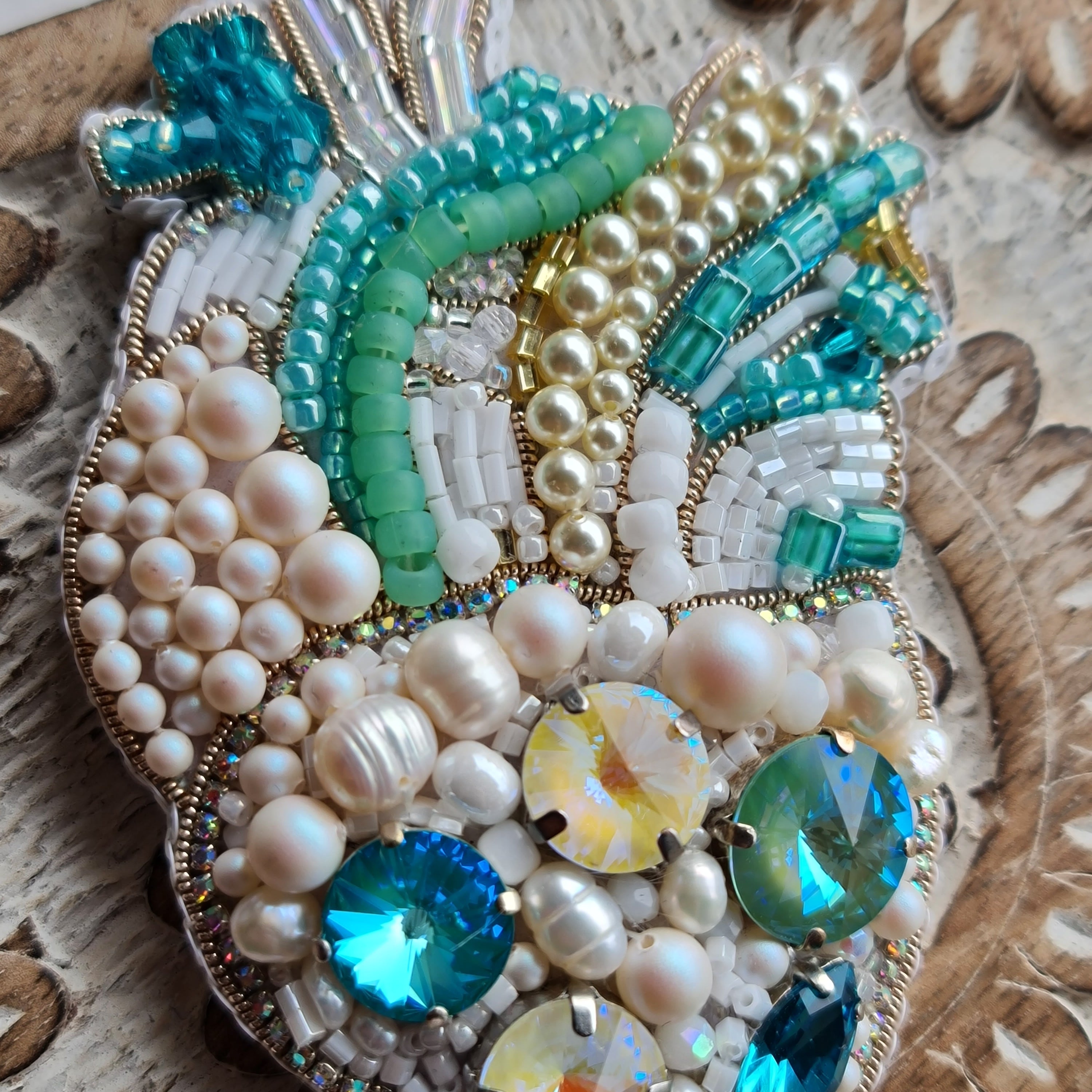 Pearl anatomical heart beaded brooch hand embroidered with turquoise crystals and pearl details