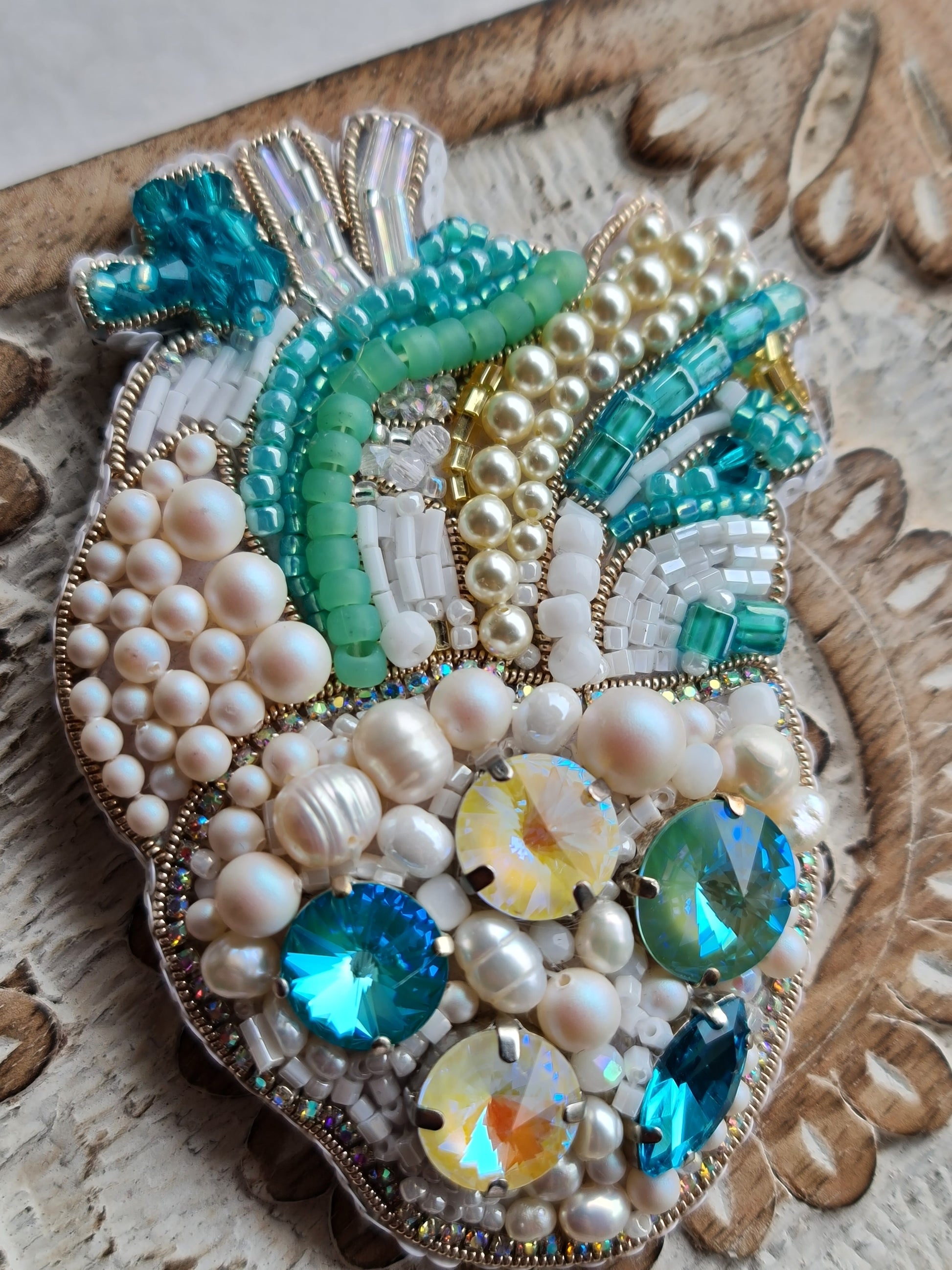 Pearl anatomical heart beaded brooch hand embroidered with turquoise crystals and pearl details