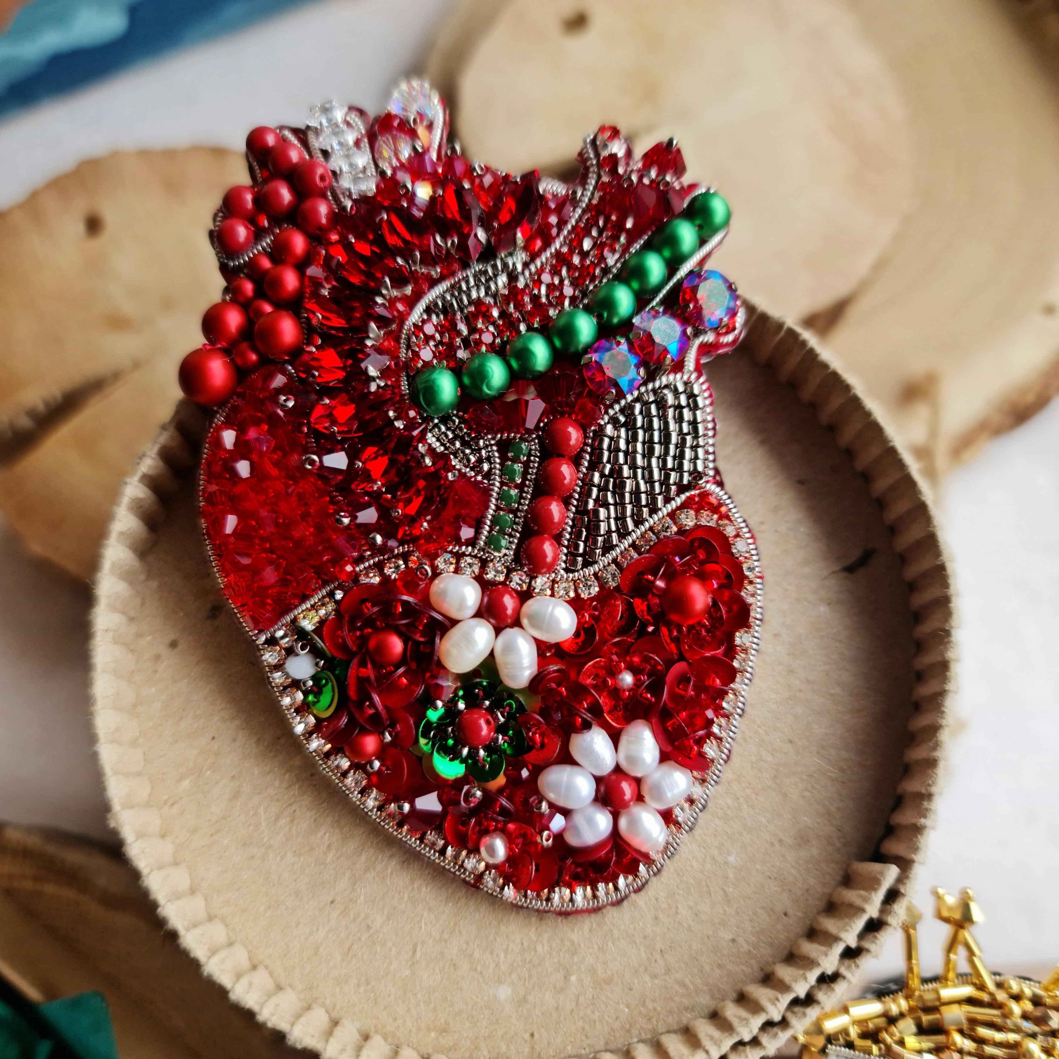 Red floral anatomical heart beaded brooch hand embroidered with crystals flowers and green details