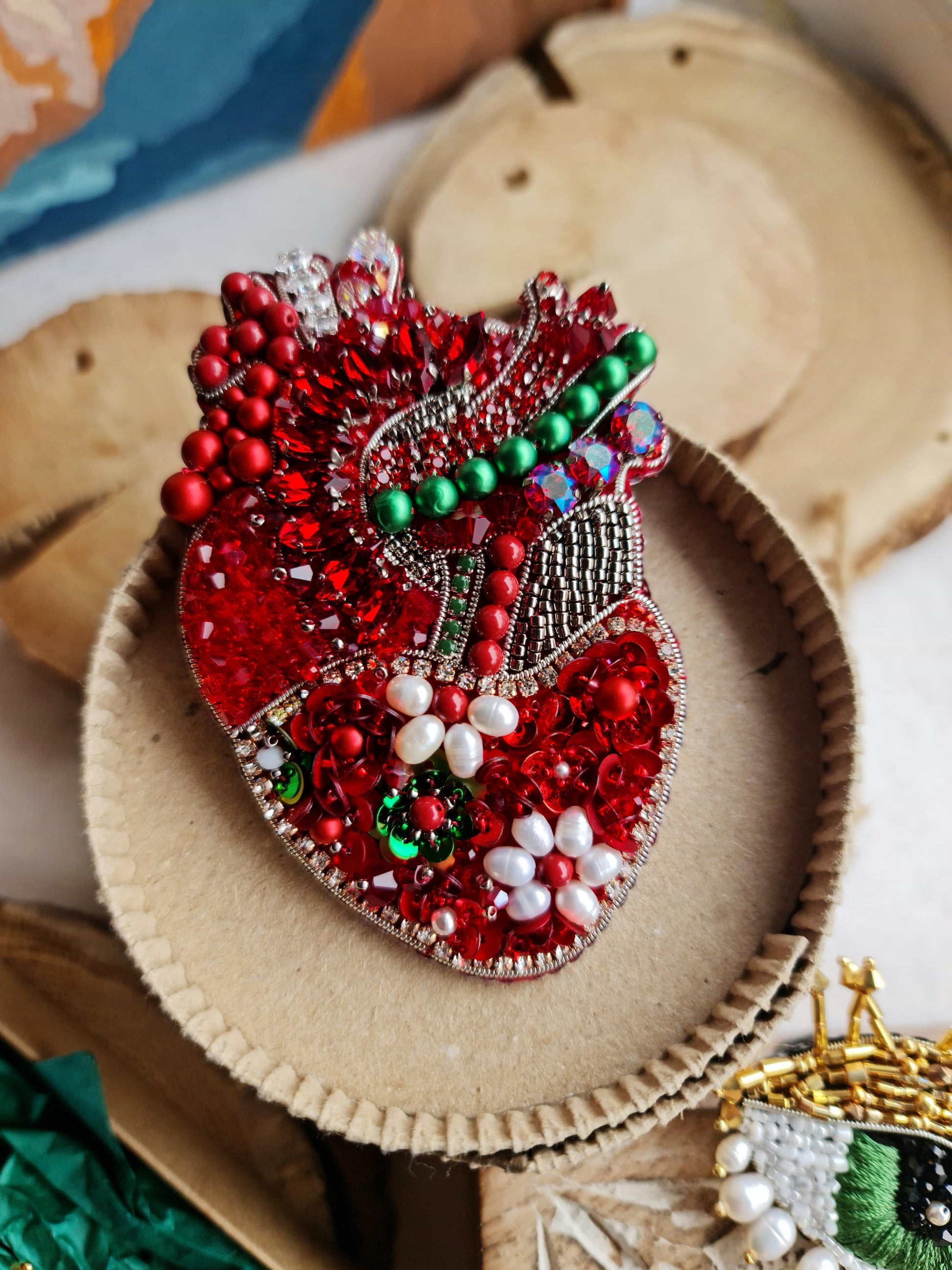 Red floral anatomical heart beaded brooch hand embroidered with crystals flowers and green details