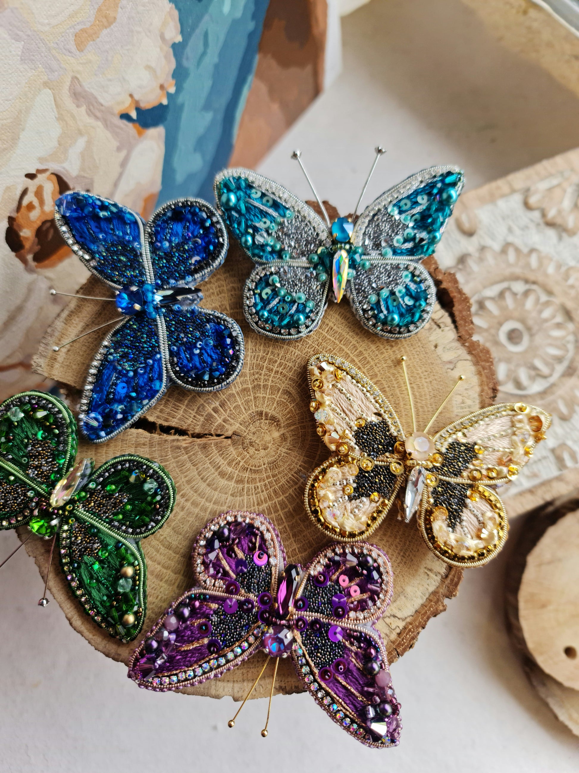 Butterfly beaded brooches hand embroidered in six colors with crystals sequins and bead details