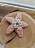Close-up of the Stellar Seas Starfish Brooch showcasing detailed beadwork and embroidery with delicate Japanese beads, crystals, and pearls on a starfish design.