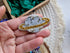 Mini Saturn beaded brooches hand embroidered in gold beige purple pink and light green colors with crystal details