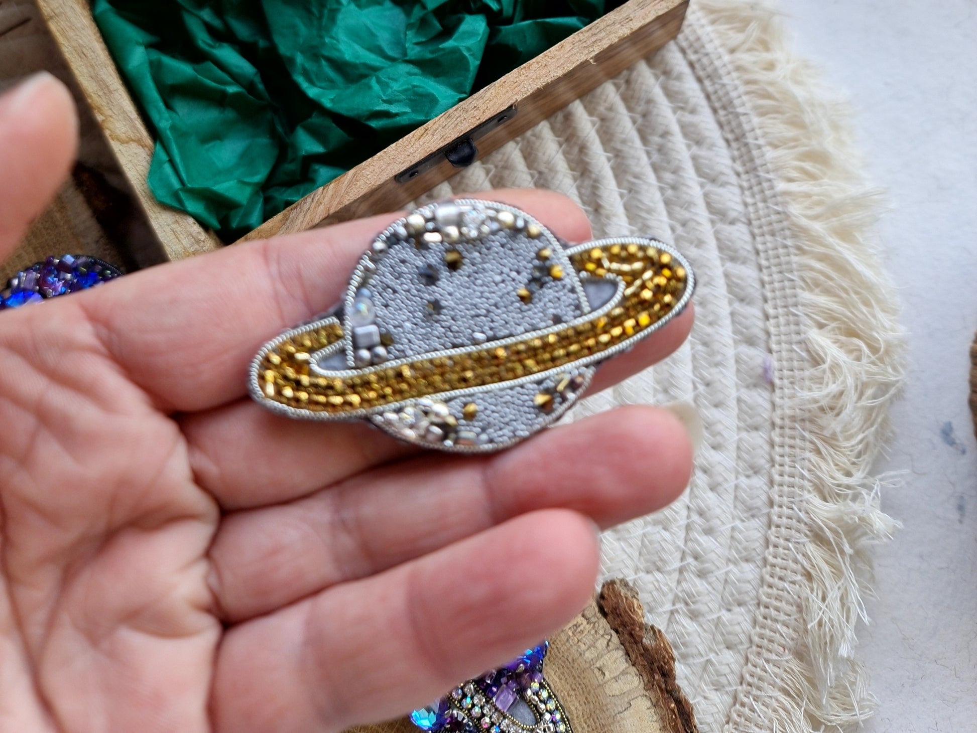 Mini Saturn beaded brooches hand embroidered in gold beige purple pink and light green colors with crystal details