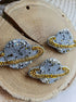 Mini Saturn beaded brooches hand embroidered in gold beige purple pink and light green colors with crystal details