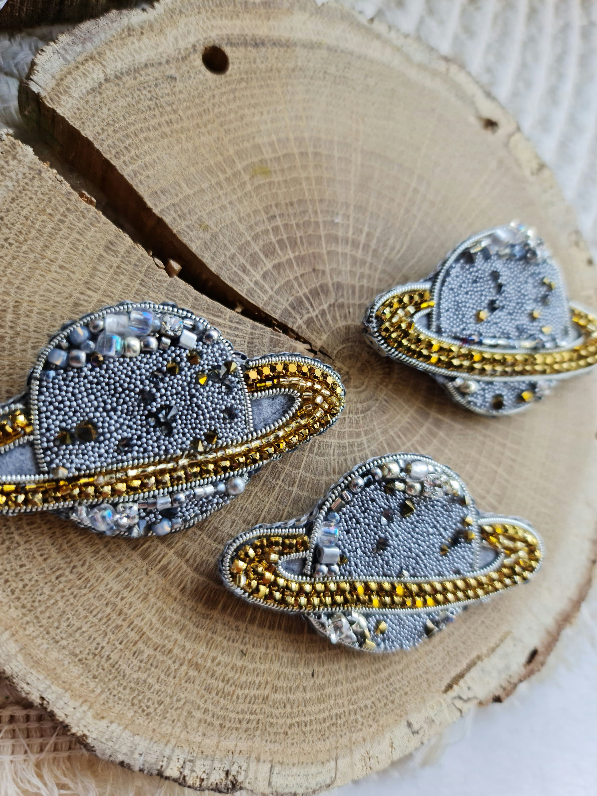 Mini Saturn beaded brooches hand embroidered in gold beige purple pink and light green colors with crystal details