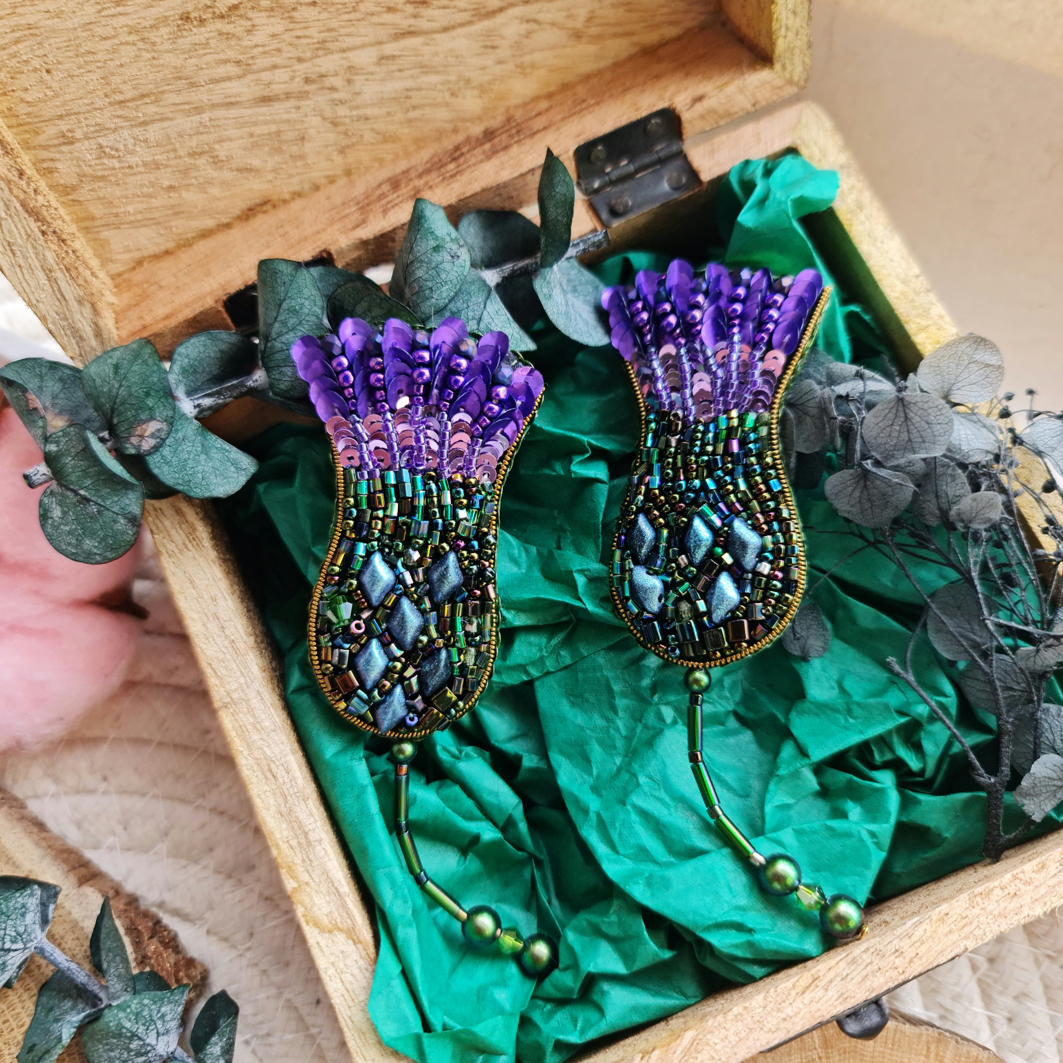Thistle beaded brooch hand embroidered with beads, sequins, crystals, and dangling details, available in gold brown, white, yellow, pink, and purple colors