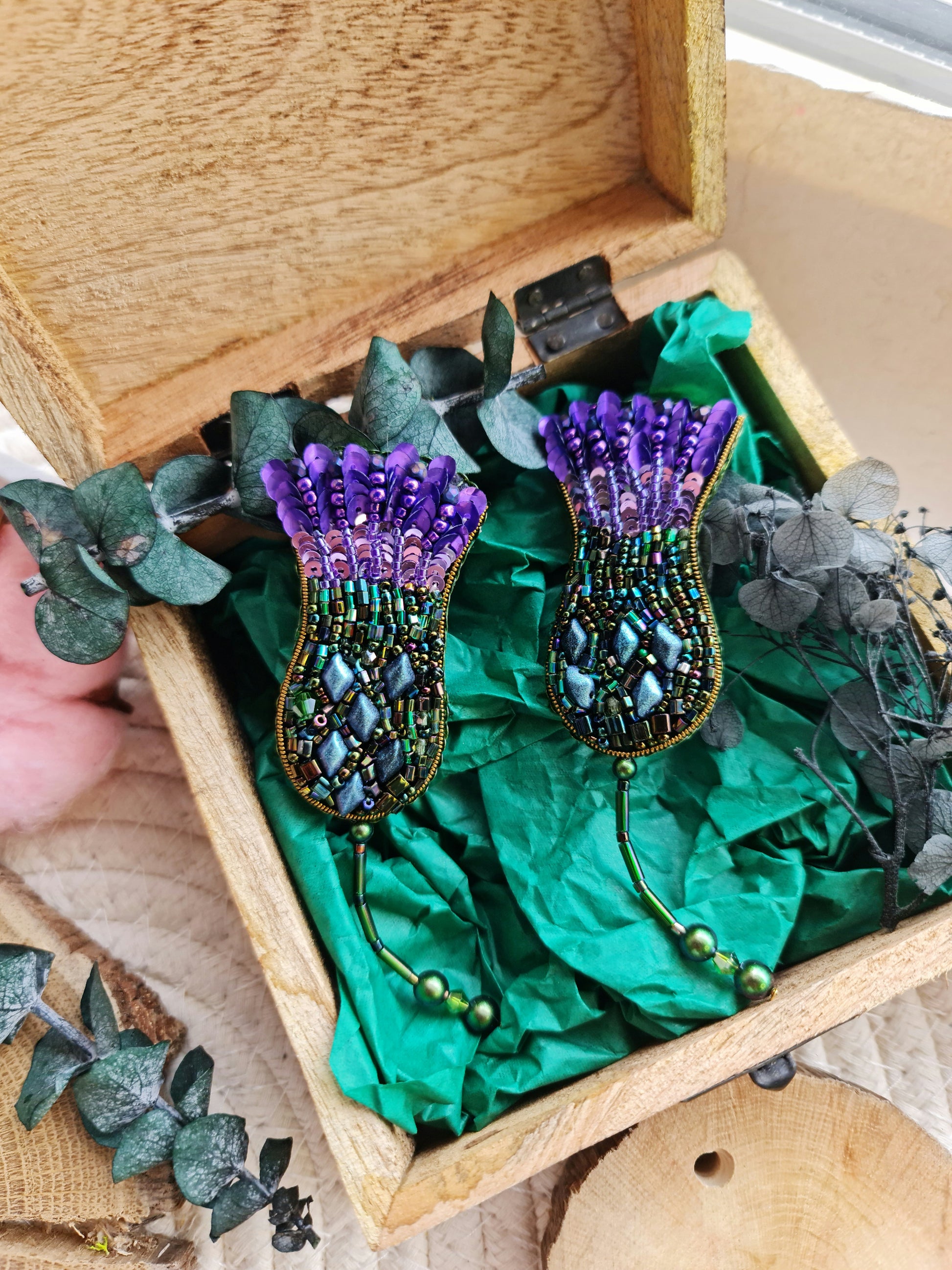 Thistle beaded brooch hand embroidered with beads, sequins, crystals, and dangling details, available in gold brown, white, yellow, pink, and purple colors