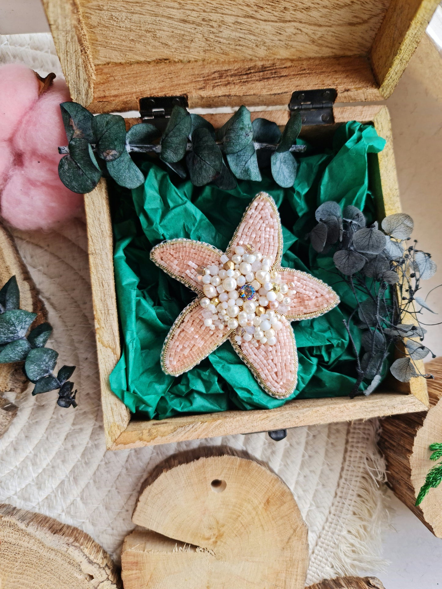 Close-up of the Stellar Seas Starfish Brooch showcasing detailed beadwork and embroidery with delicate Japanese beads, crystals, and pearls on a starfish design.