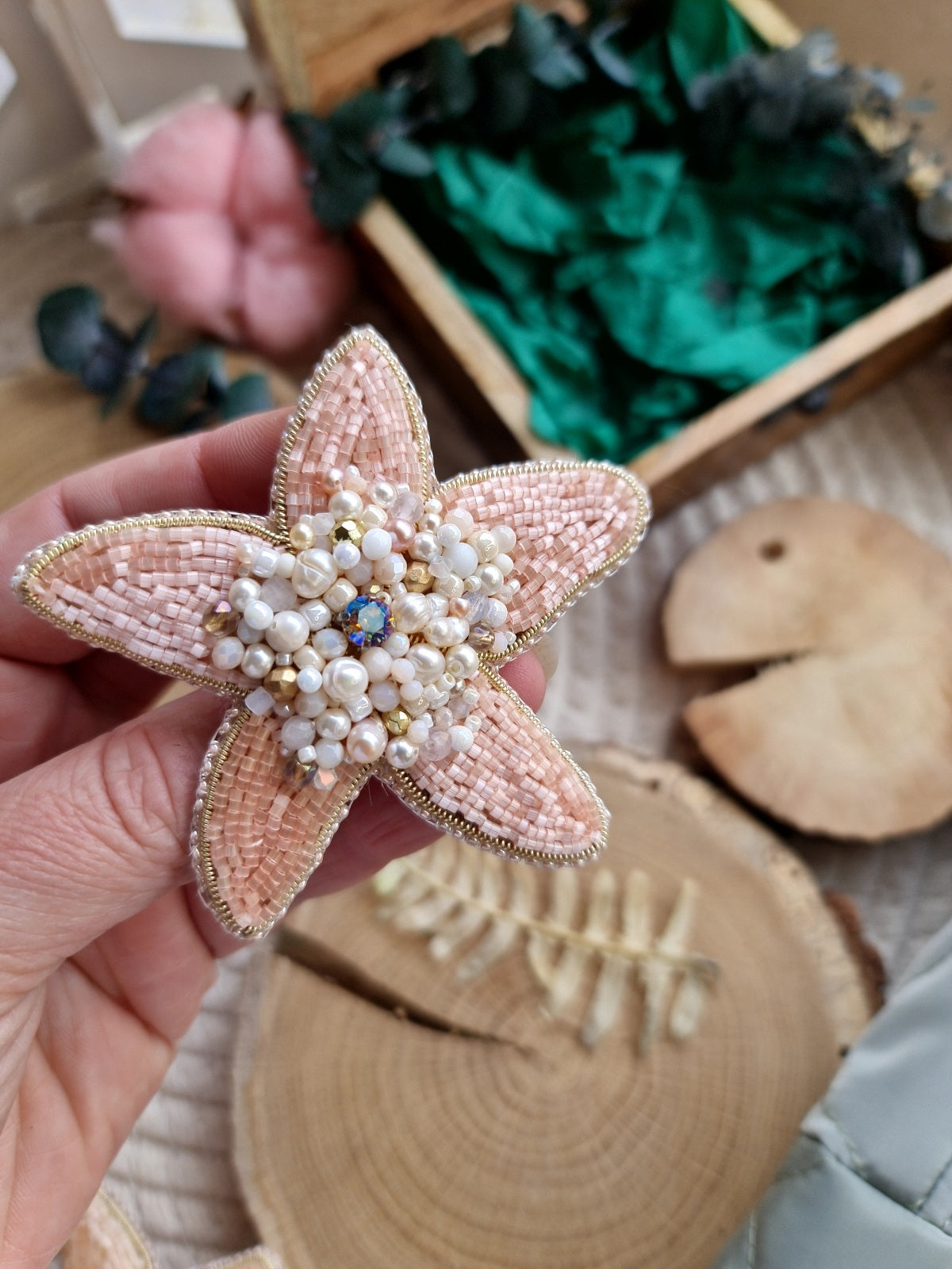 Close-up of the Stellar Seas Starfish Brooch showcasing detailed beadwork and embroidery with delicate Japanese beads, crystals, and pearls on a starfish design.
