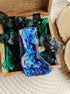 Blue body art beaded brooch hand embroidered with glass beads, crystals, and abstract female body silhouette details