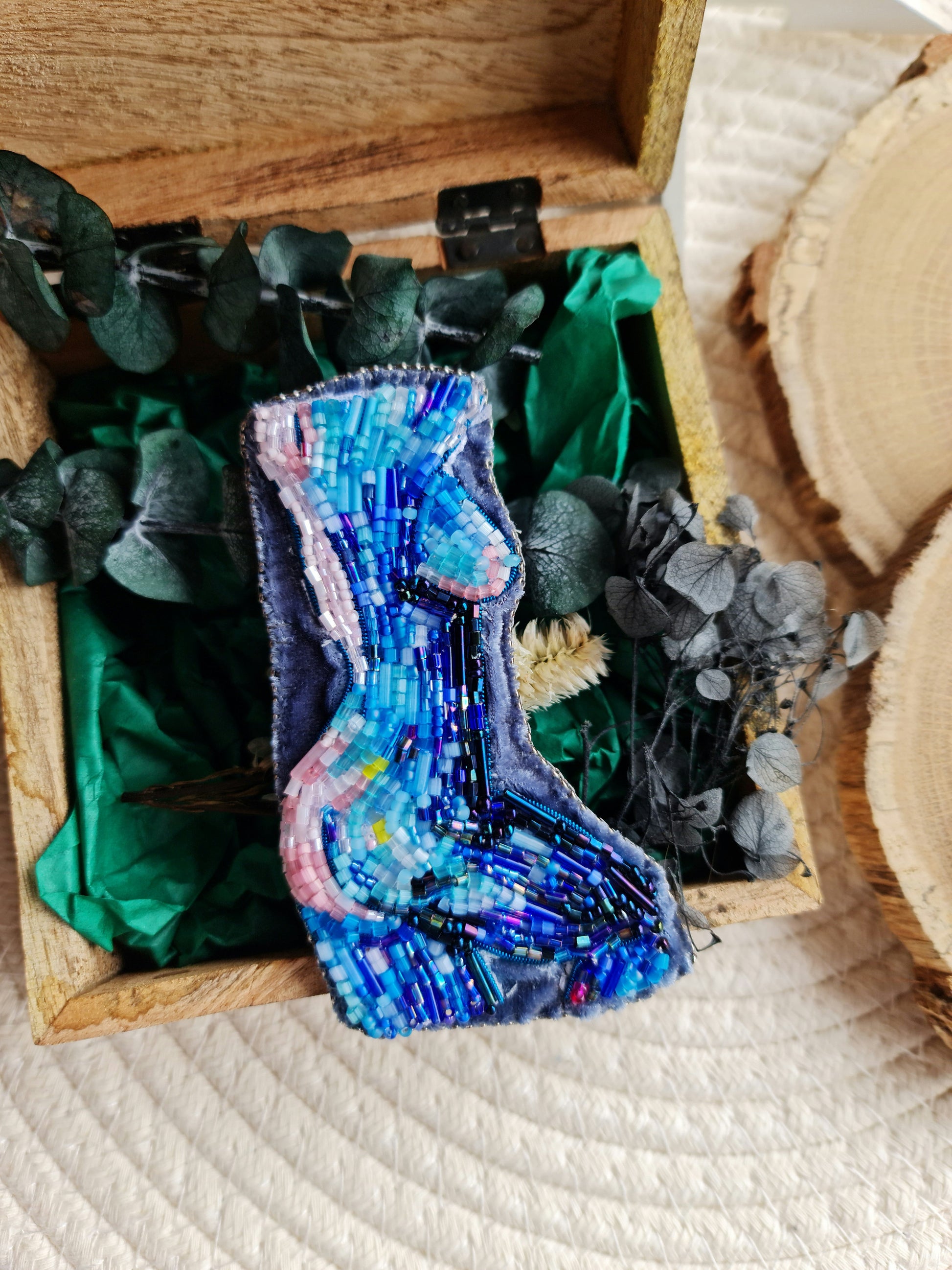 Blue body art beaded brooch hand embroidered with glass beads, crystals, and abstract female body silhouette details
