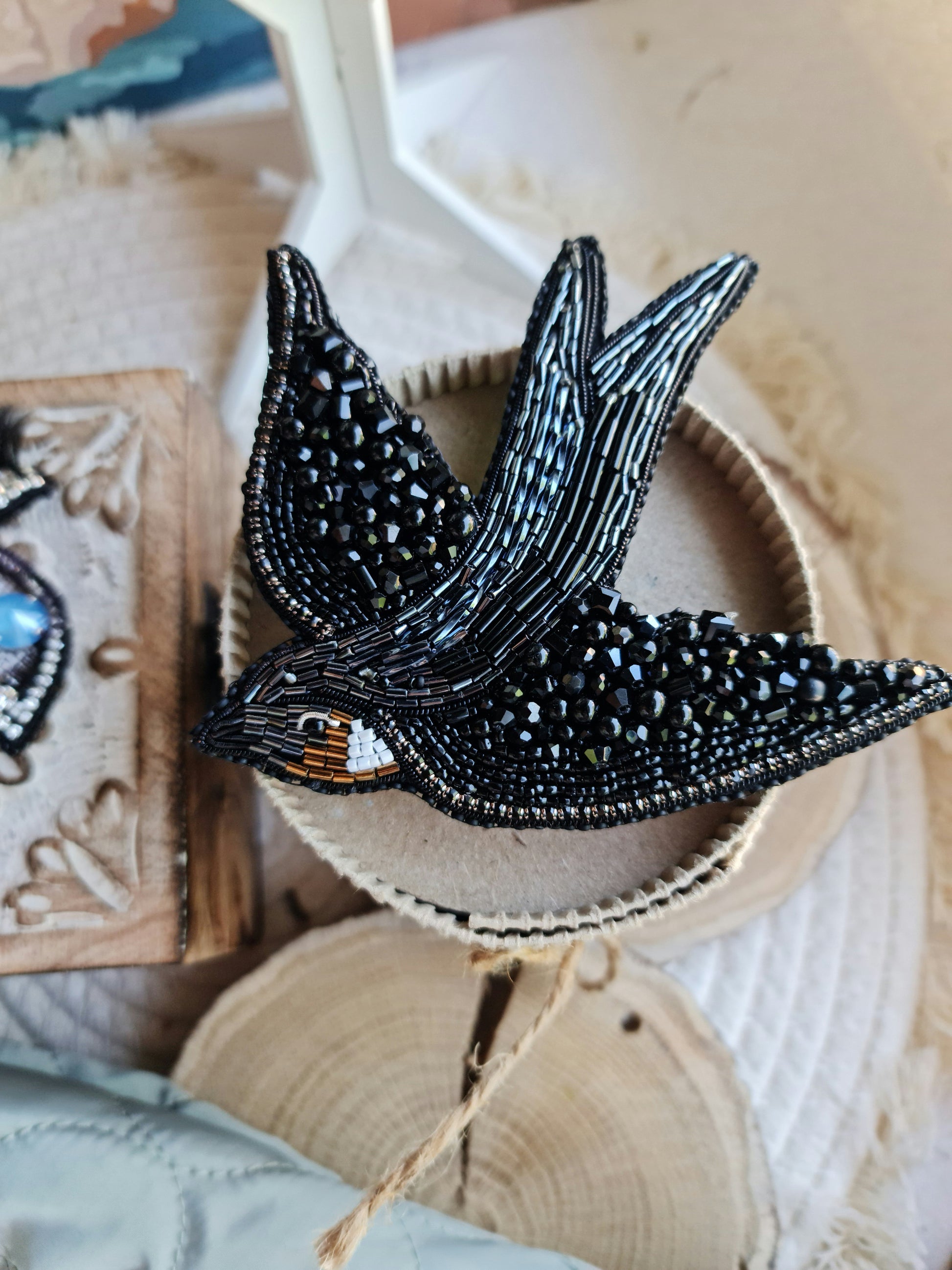 Black swallow bird beaded brooch hand embroidered with black beads crystals and bronze white details
