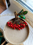 Red berry branch beaded brooch hand embroidered with green leaves and bead details