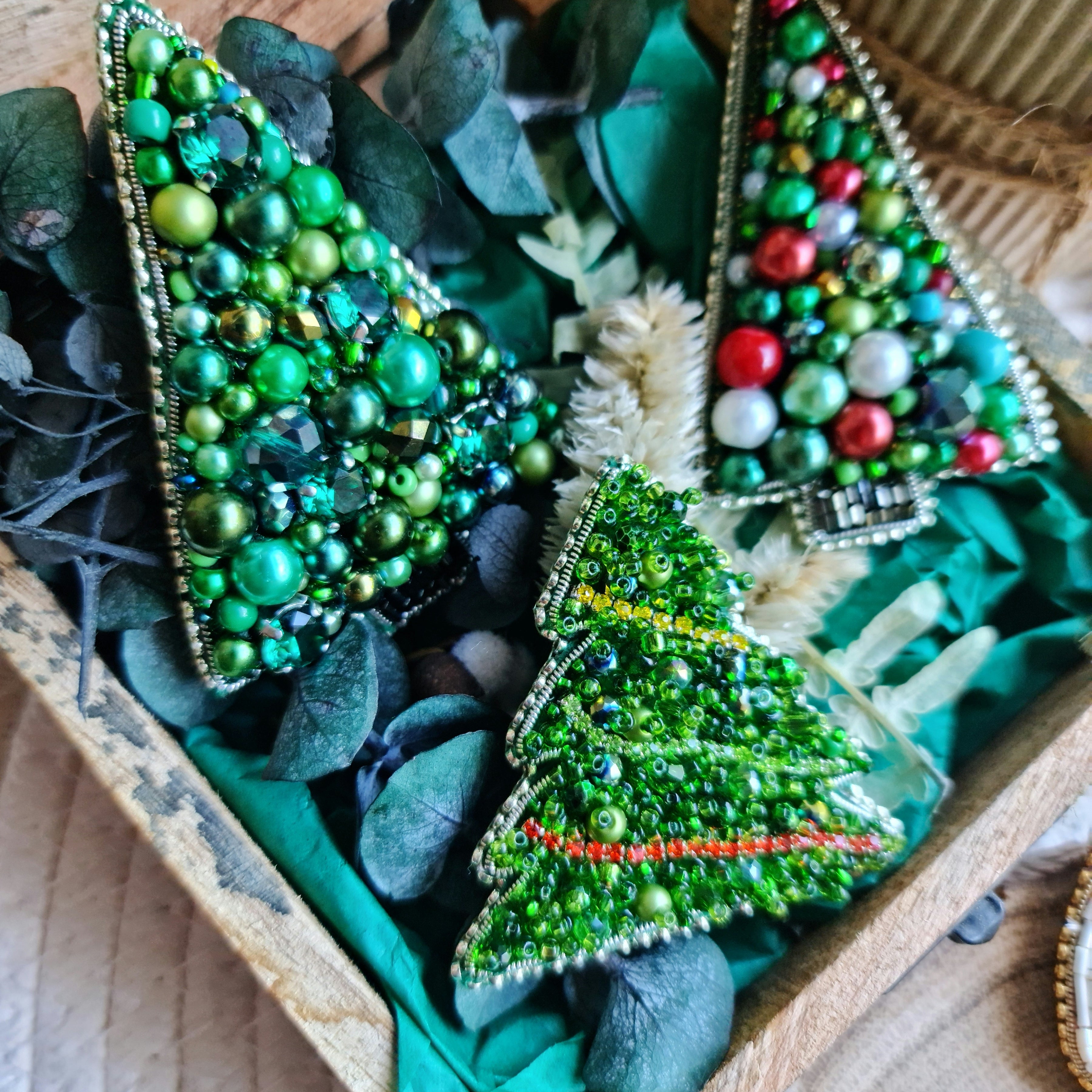 Three handmade Christmas tree beaded brooches with pearls crystals and colorful holiday details