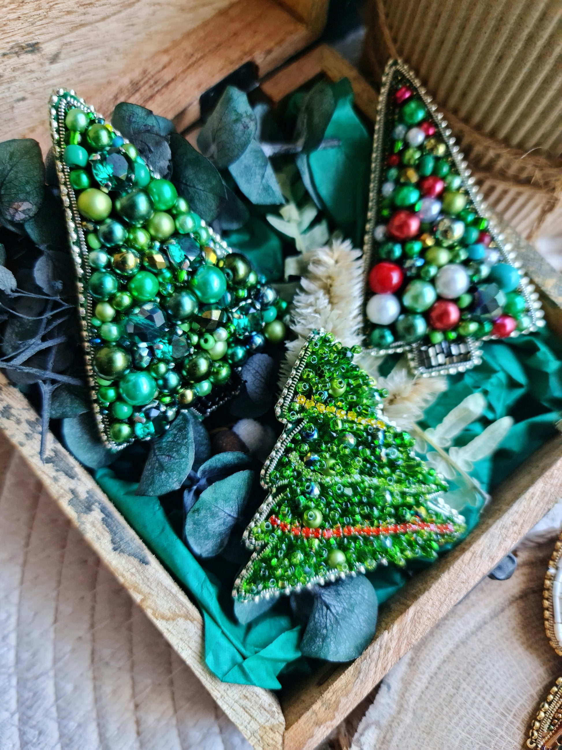Three handmade Christmas tree beaded brooches with pearls crystals and colorful holiday details
