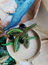 Olive branch beaded brooch hand embroidered with green beads black crystals and leaf details